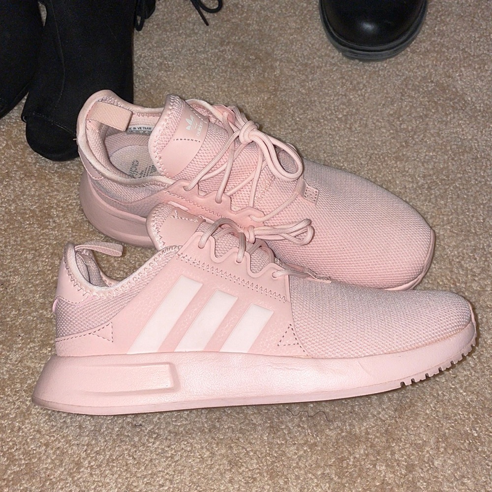 In great condition pink Adidas sneakers